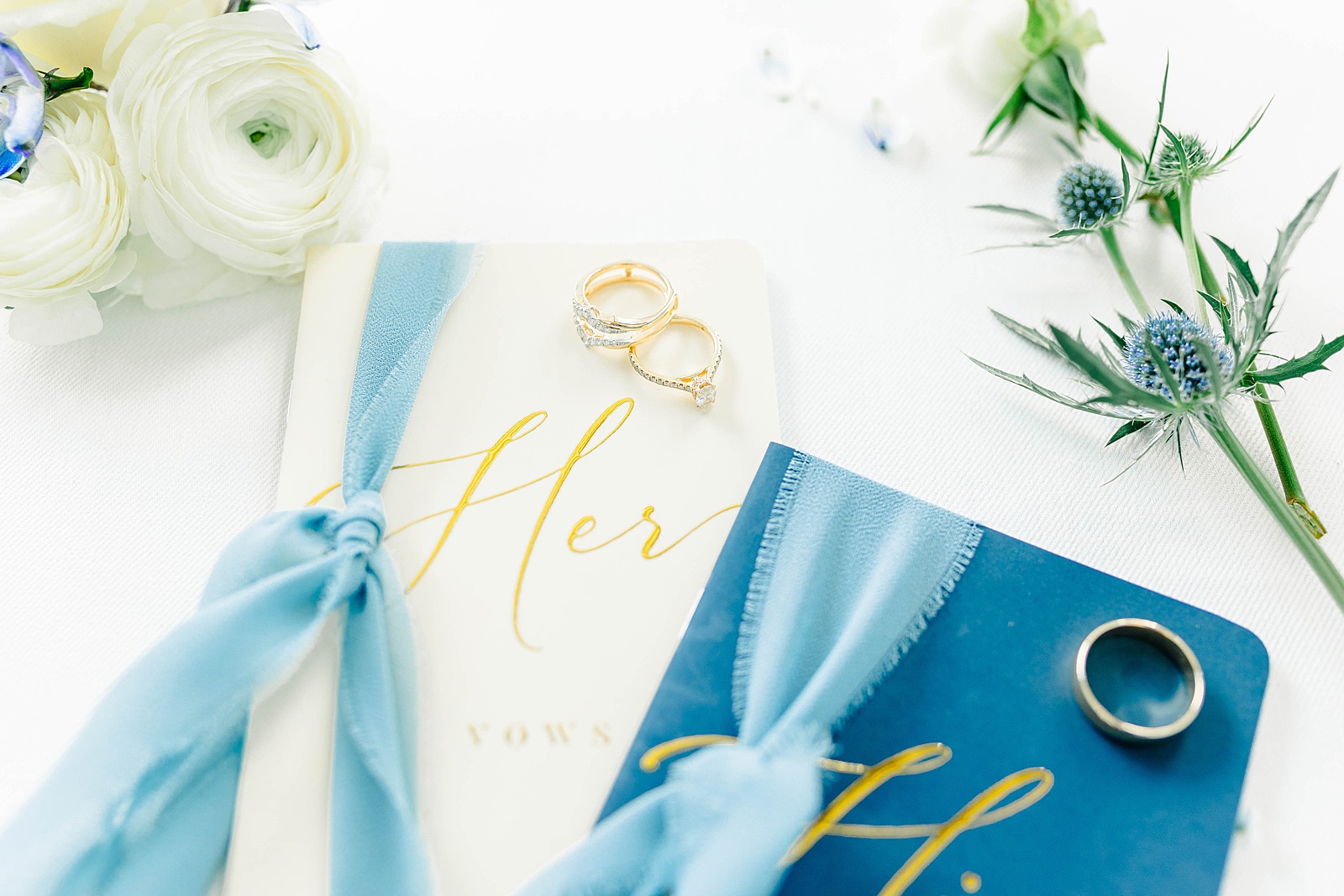 Blue and White Velvet vow books for a fall wedding at The English Country Barn. 
