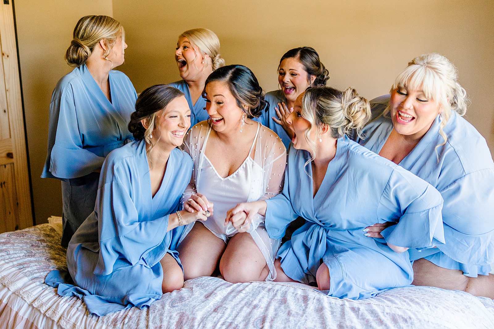 Getting ready photos in blue pajamas at The English Country Barn.