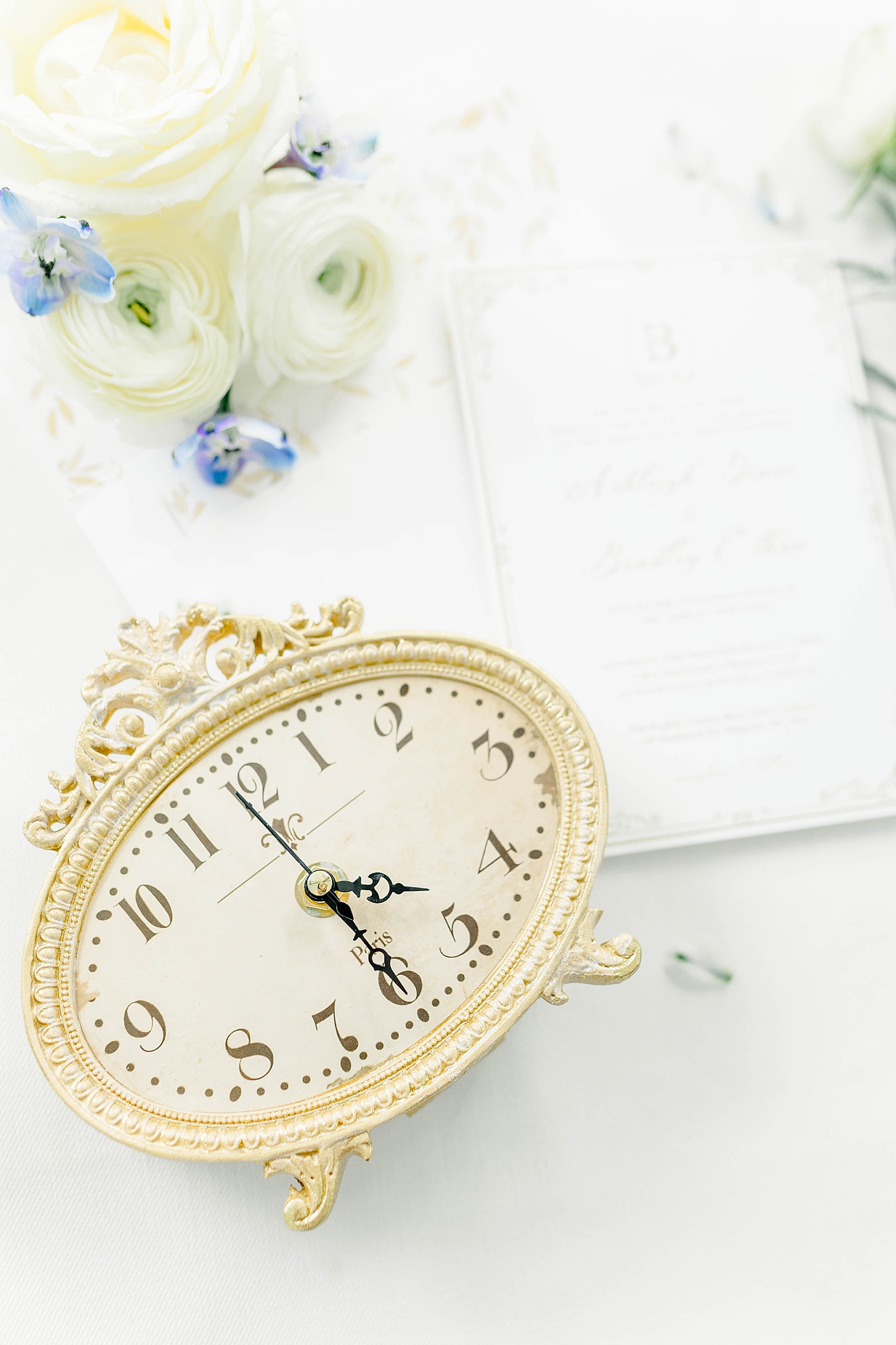 Fall white and blue wedding details with an antique clock. wedding at The English Country Barn by Kelsie Zeagler Photography. 