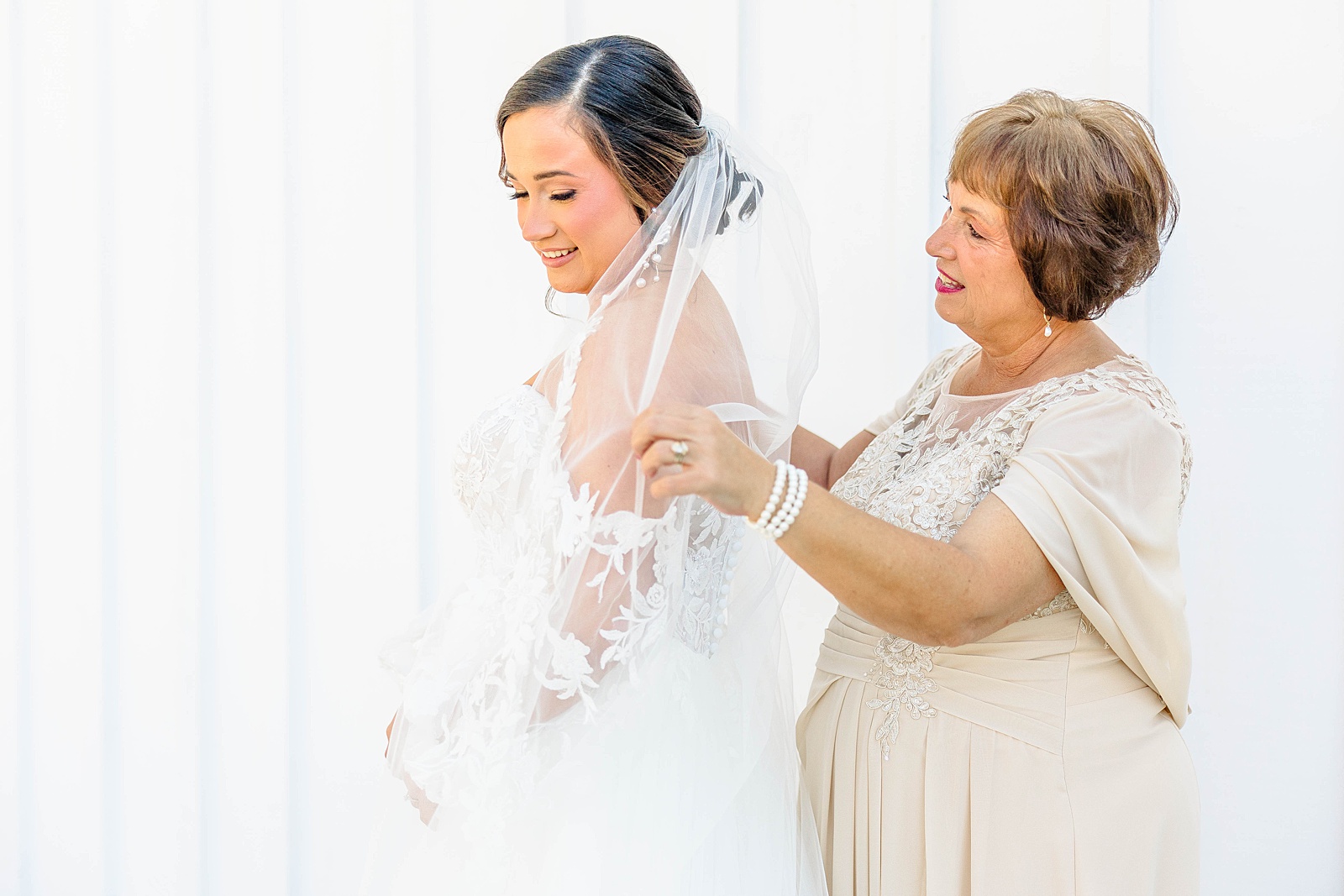 Bride's final touches at a fall wedding at The English Country Barn in North Carolina. 