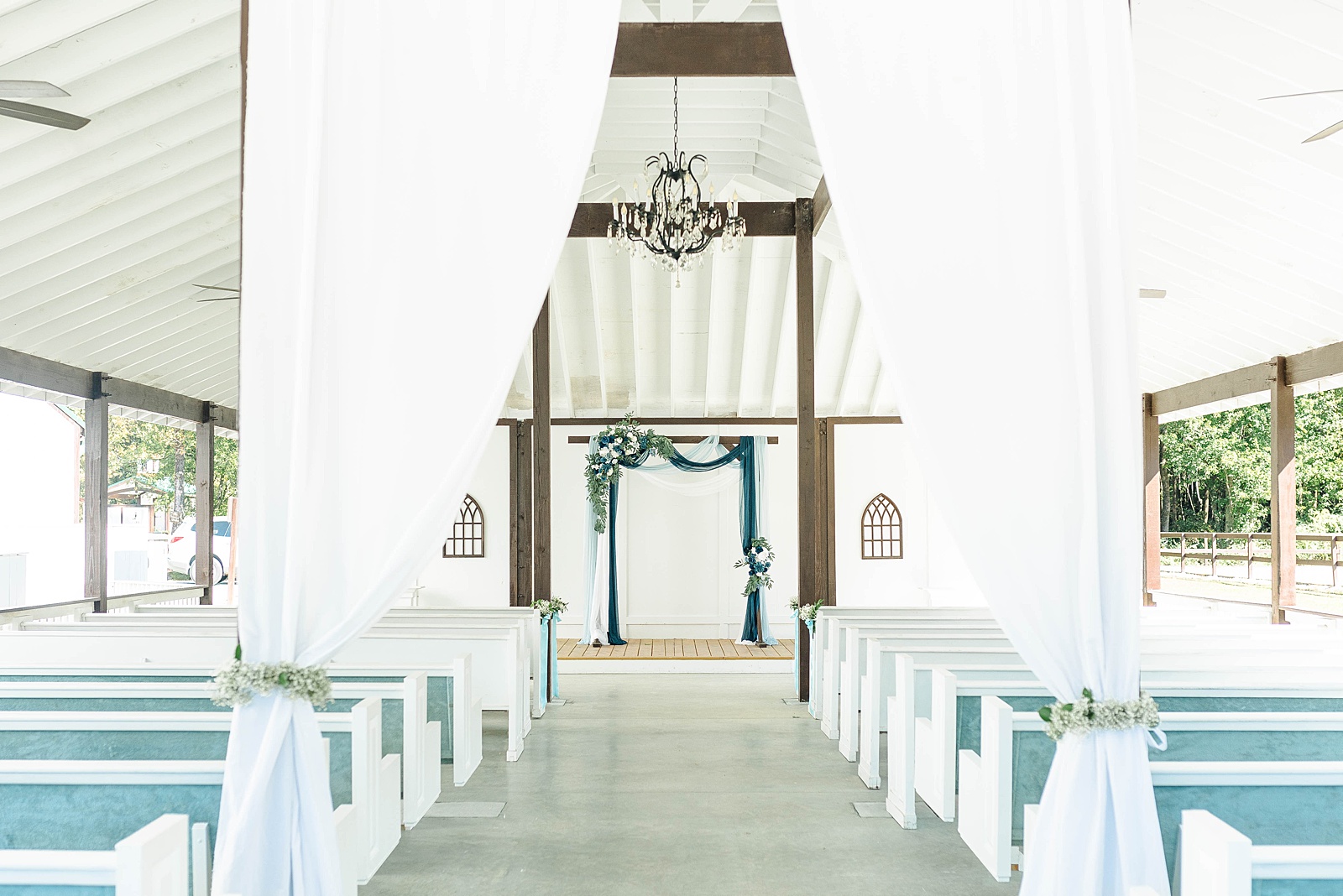 Ceremony space of the English Country Barn wedding venue in North Carolina. 