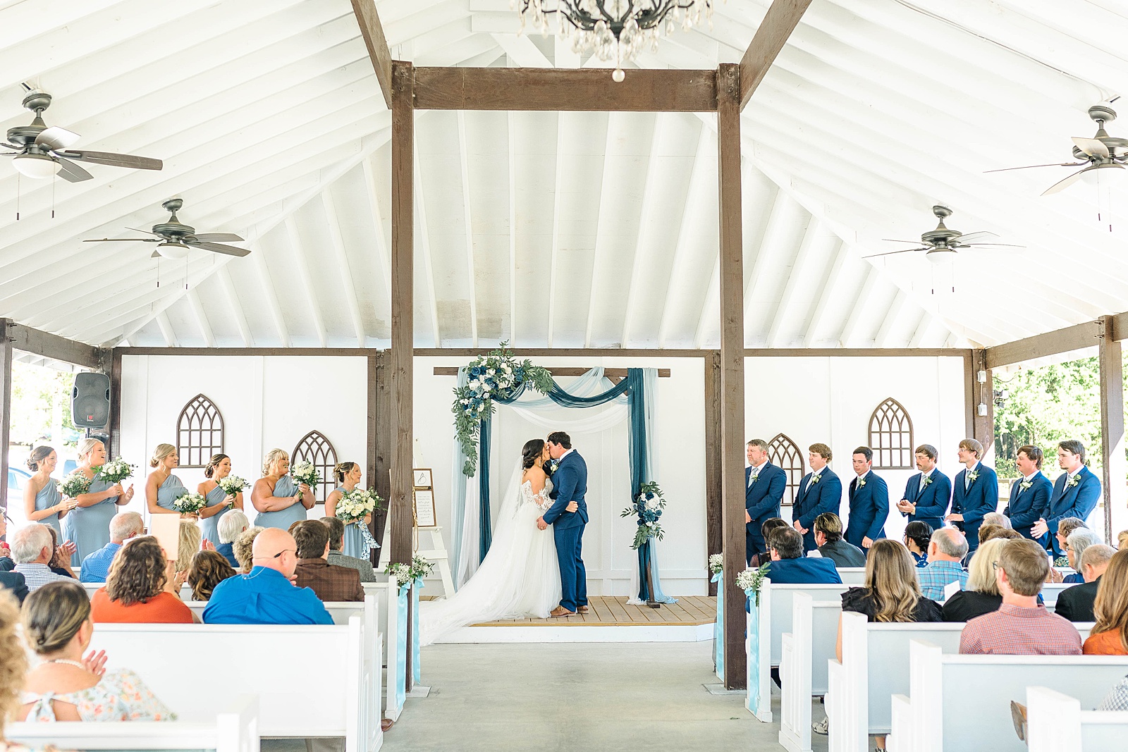 First Kiss during a wedding at The English Country Barn in North Carolina. 