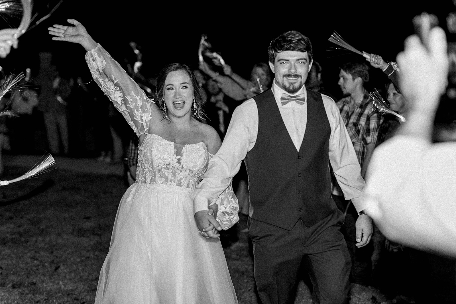 Bride and Groom exit at North Carolina wedding. Photo by Kelsie Zeagler Photography 