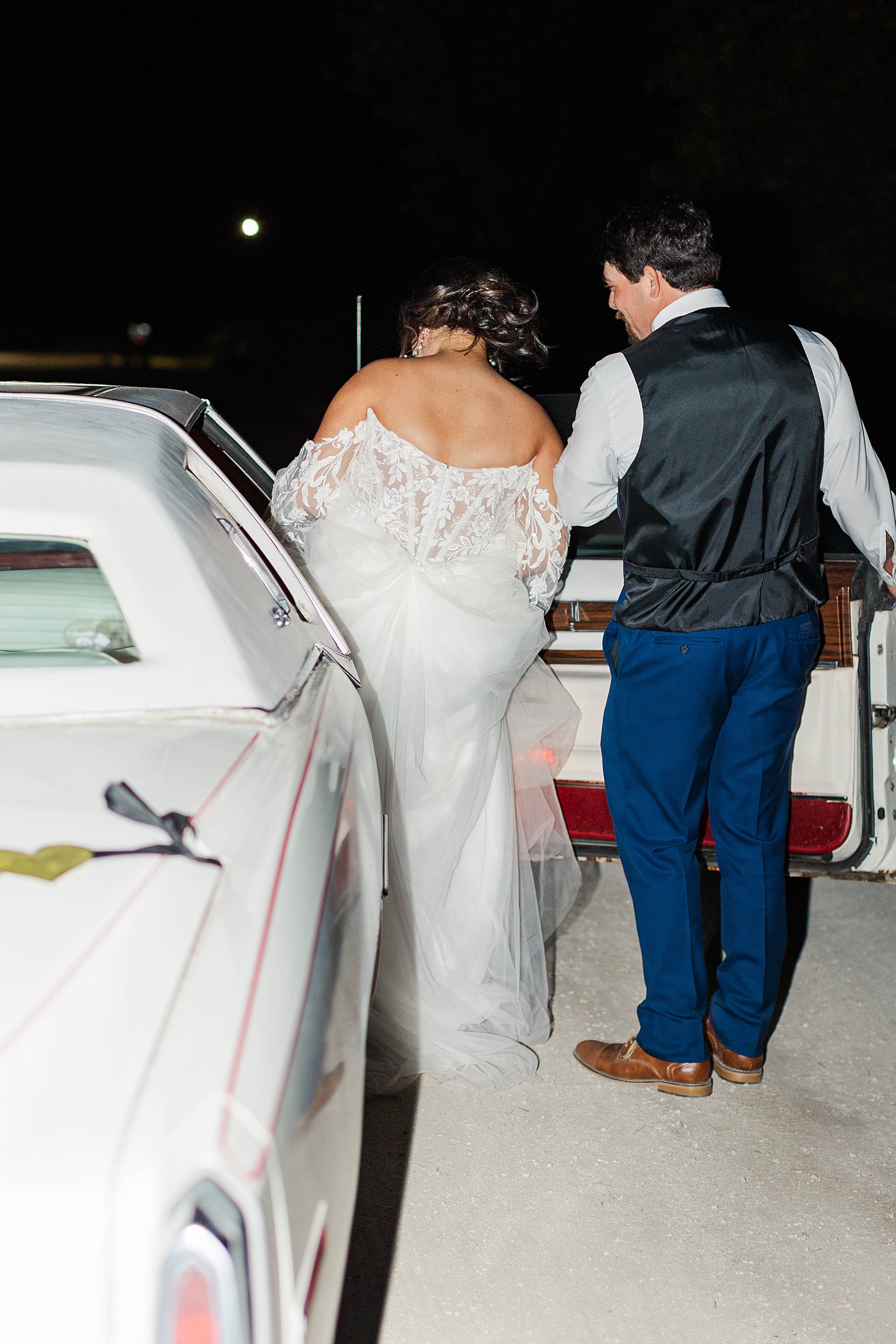 Getaway Cadillac for a full Blue and white NC wedding at The English Country Barn