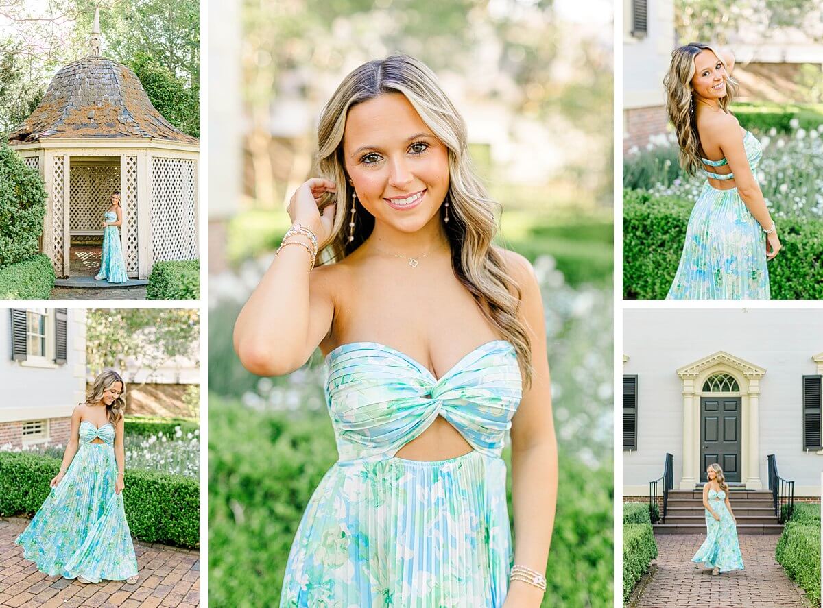 High school senior girl in a pastel blue floral dress posing in front of historic homes and spring gardens at Tryon Palace in New Bern, NC