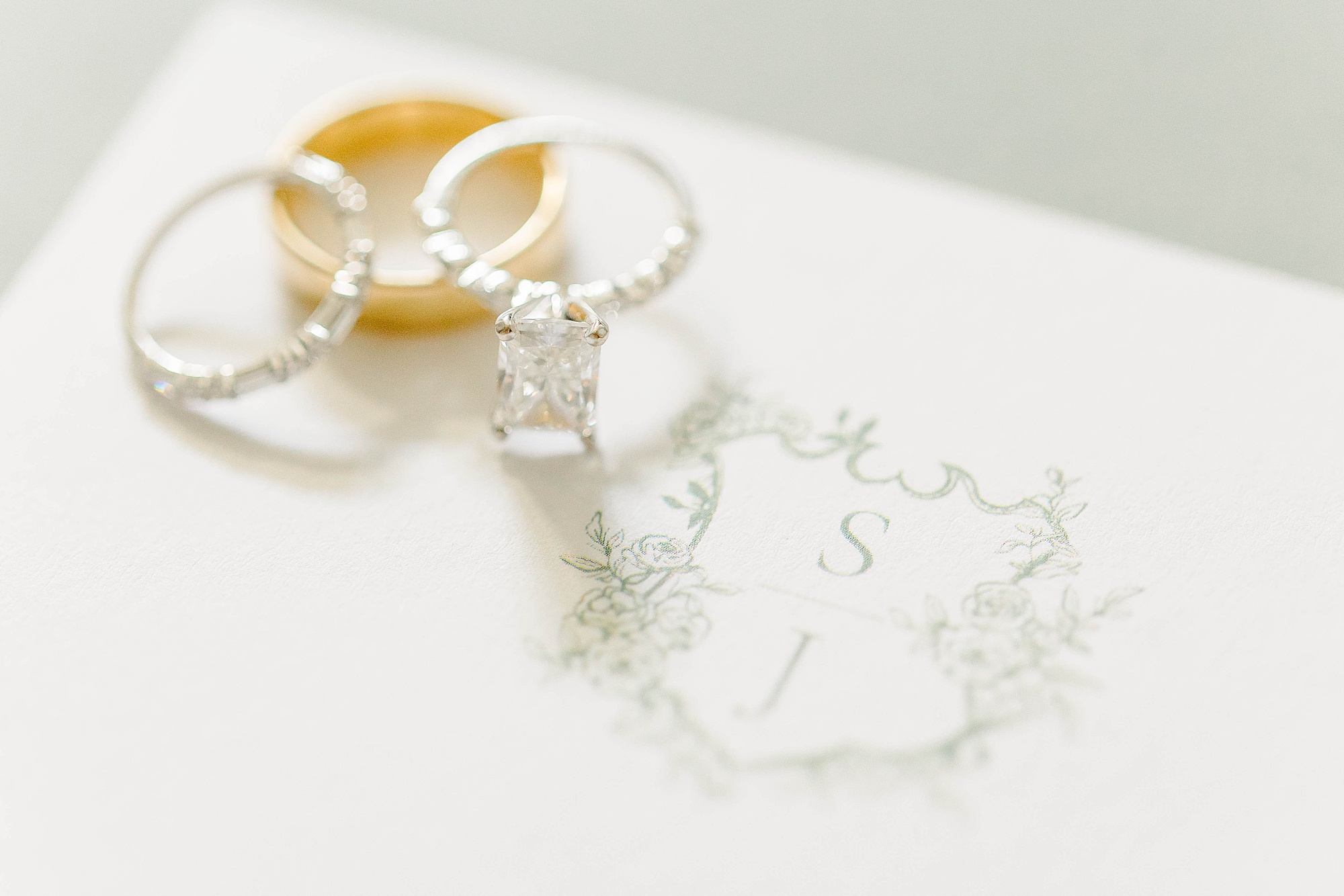 Wedding rings with wedding crest for Meredith College wedding