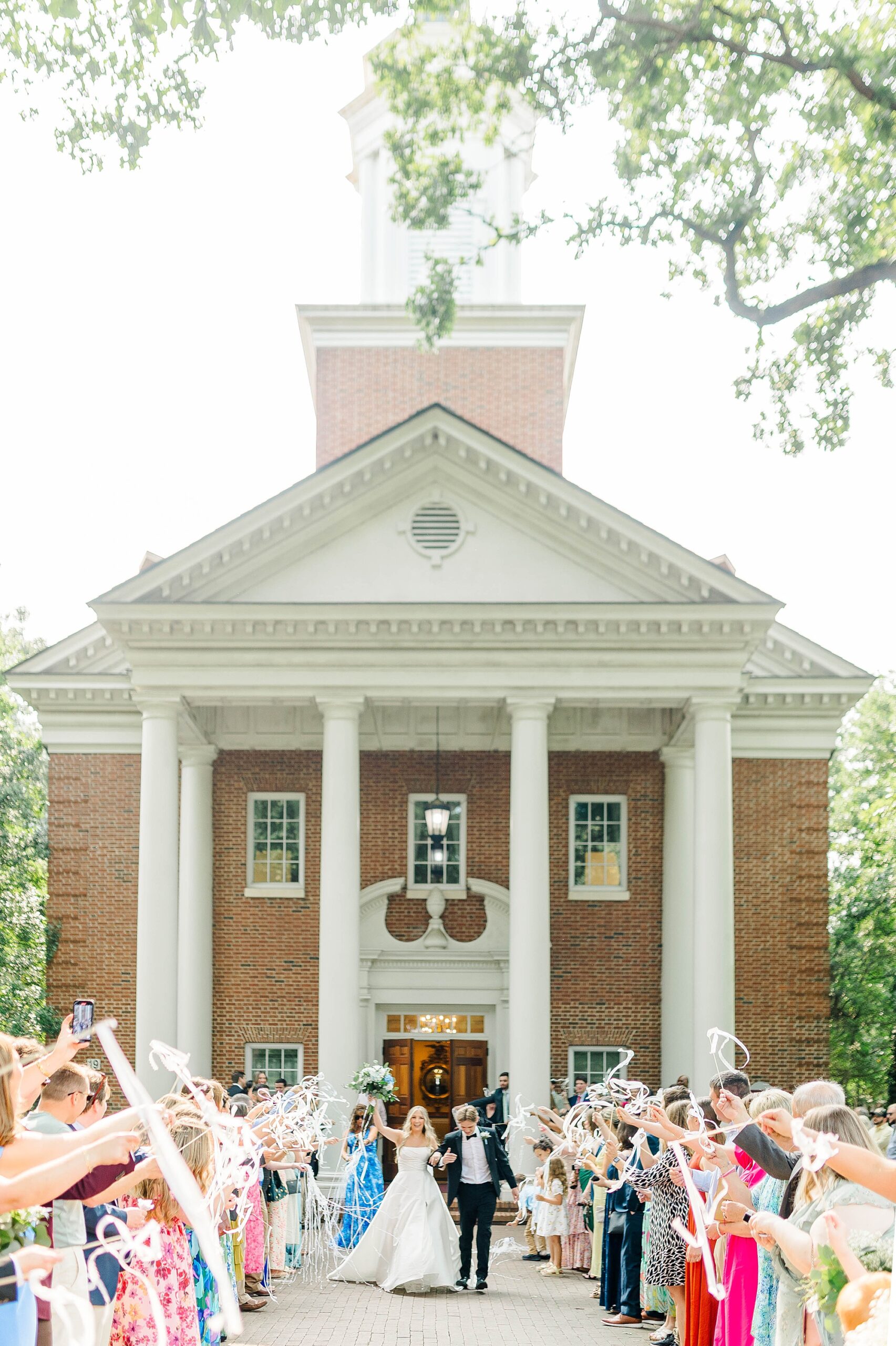 Ribbon exit out of the Meredith College Chapel for wedding ceremony