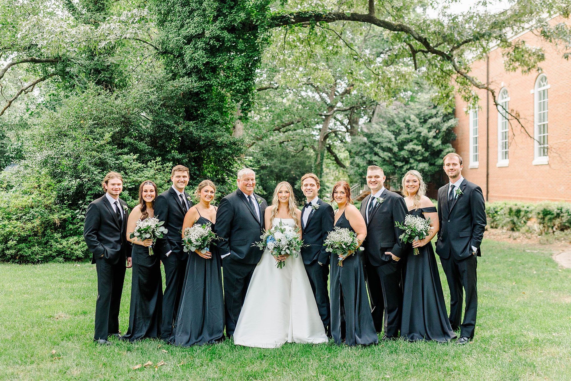 Bridal party in black at Meredith College