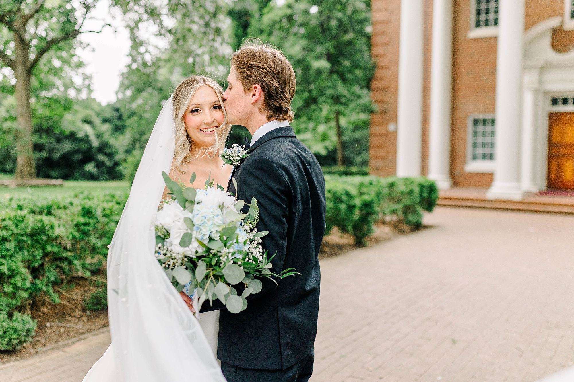 Bride and groom getting married at The Meredith College Chapel 
