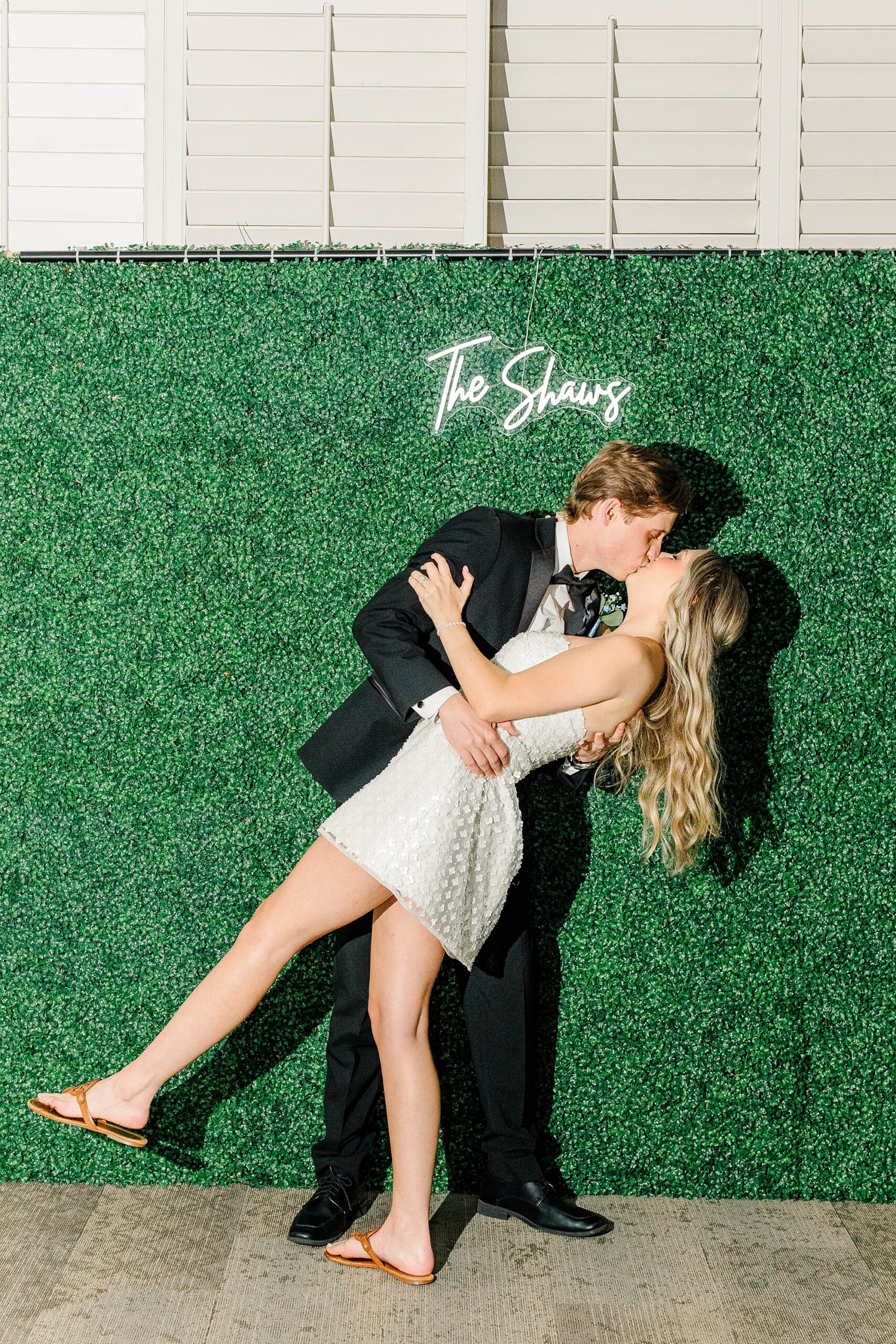 Wedding photo wall at NC State Alumni building