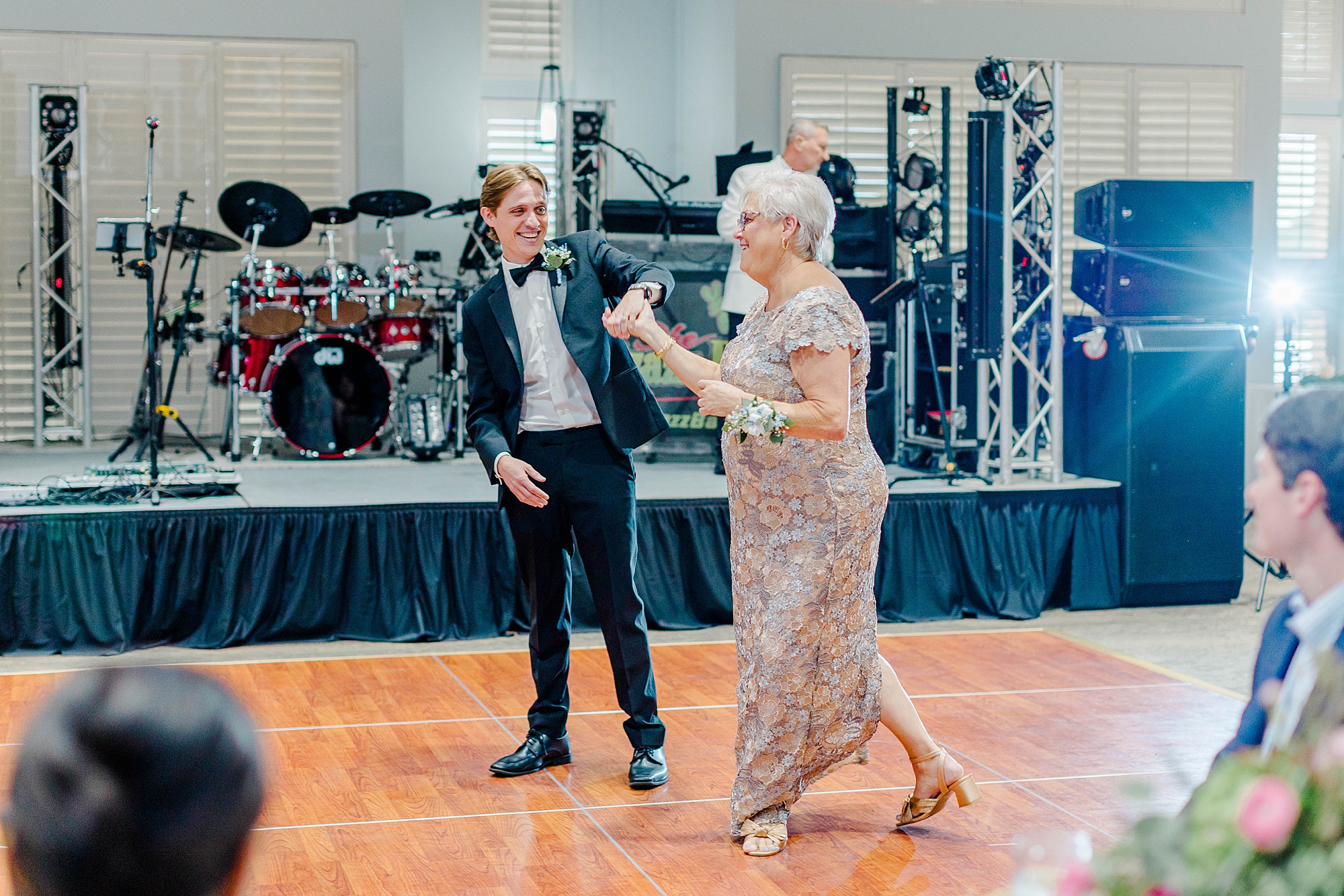 Groom dancing with his mom at wedding reception